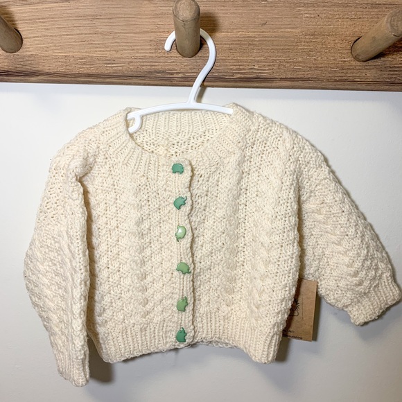 Hand knit baby sweater with elephant buttons - Picture 1 of 3